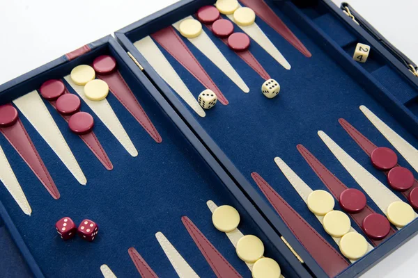 Brettspiele - Backgammon im Spiel Stockbild
