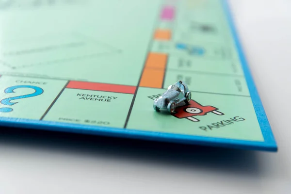 Monopoly board game in play — Stock Photo, Image