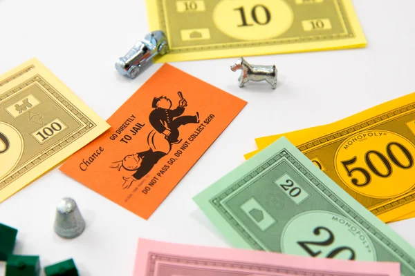 Monopol brädspel i play — Stockfoto