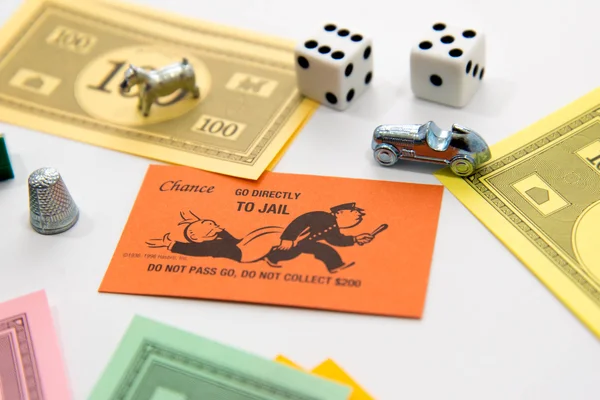 Monopólio jogo de tabuleiro em jogo — Fotografia de Stock