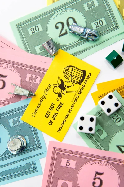 Monopoly board game in play — Stock Photo, Image