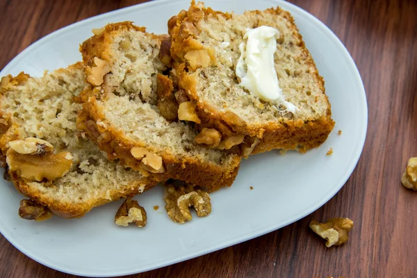 Fresh buttered banana walnut bread — Stock Photo, Image