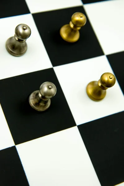 Chess game - pieces in play on chessboard — Stock Photo, Image