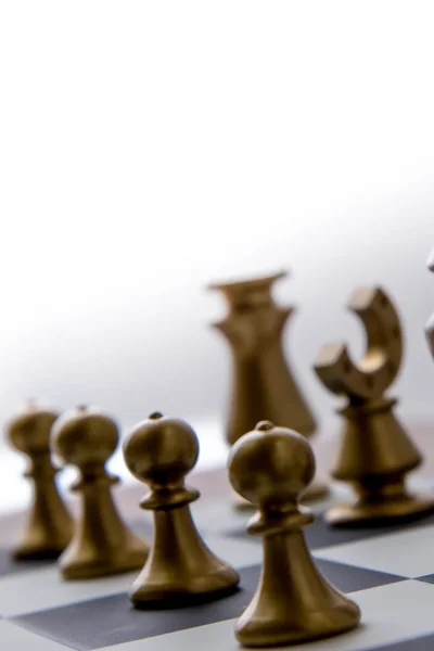 Chess game - view of playing pieces on chessboard — Stock Photo, Image