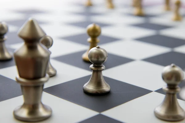 Chess game - view of playing pieces on chessboard — Stock Photo, Image