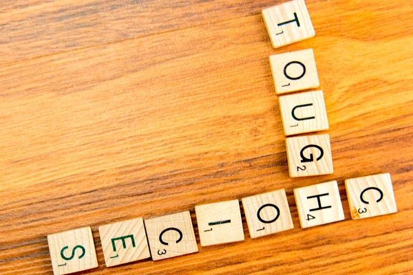 Scrabble breve - TOUGH CHOICES - Stock-foto