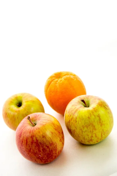 Line of apples with one orange — Stock Photo, Image