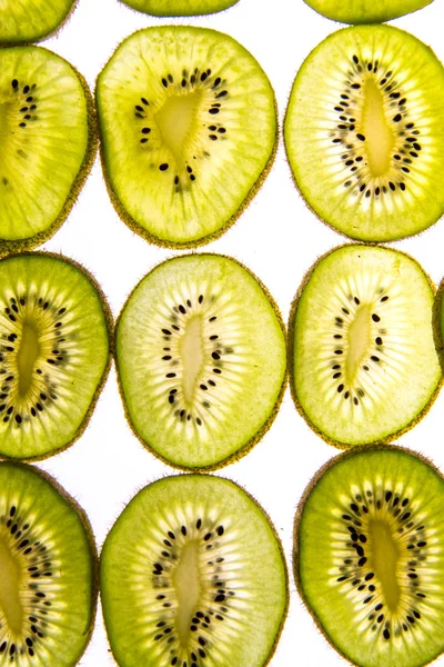 Podsvícený plátky kiwi — Stock fotografie