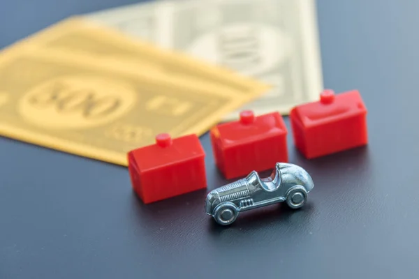 8. Februar 2015: houston, tx, usa. Monopolgeld, Auto und Rot — Stockfoto