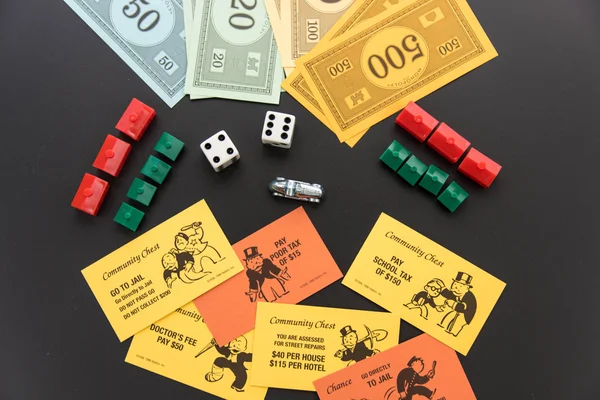8. Februar 2015: houston, tx, usa. Monopolgeld, Kuchenspiel lizenzfreie Stockbilder