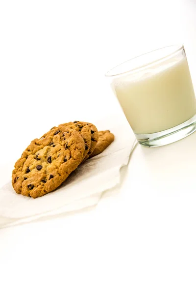 Chocolate chip cookies and glass of milk Stock Image