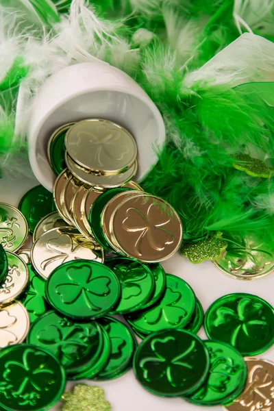 Saint Patrick's Day - coins and shamrocks — Stock Photo, Image
