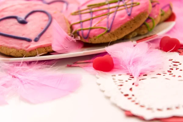 Valentines Day - decorations and cookies with pink frosting and — Stock Photo, Image