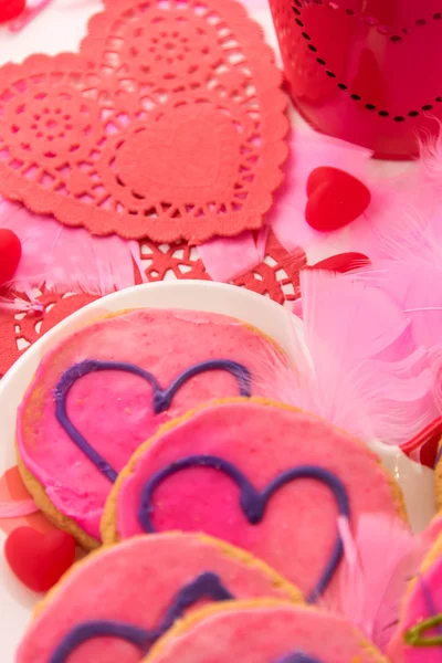 Valentines Day - decorations and cookies with pink frosting and — Stock Photo, Image