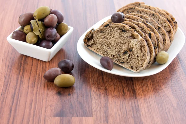 Fresh baked olive bread slices — Stock Photo, Image