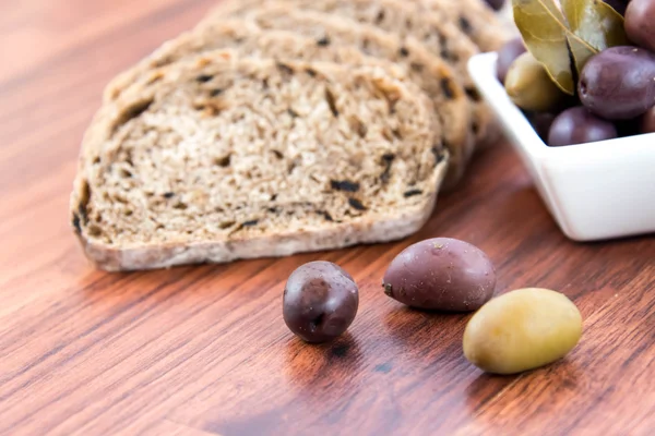 Fresh baked olive bread slices — Stock Photo, Image