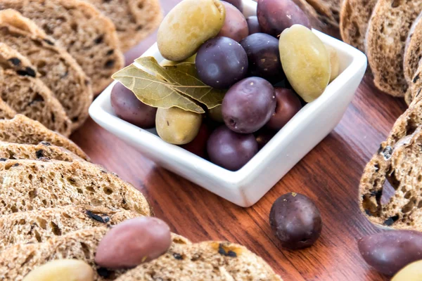 Fresh baked olive bread slices — Stock Photo, Image