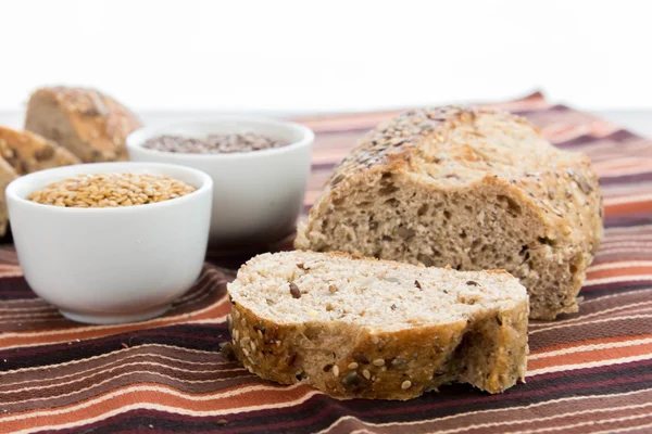 A fresh baked loaf of whole grains bread — Stock Photo, Image