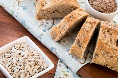a fresh baked loaf of whole grains bread clipart
