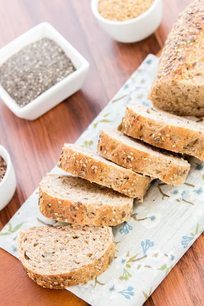 A fresh baked loaf of whole grains bread — Stock Photo, Image