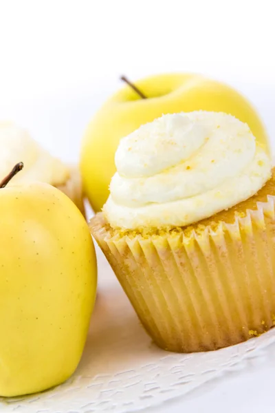 Gele apple vs gele cupcake — Stockfoto