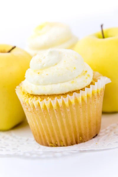 Gele apple vs gele cupcake — Stockfoto