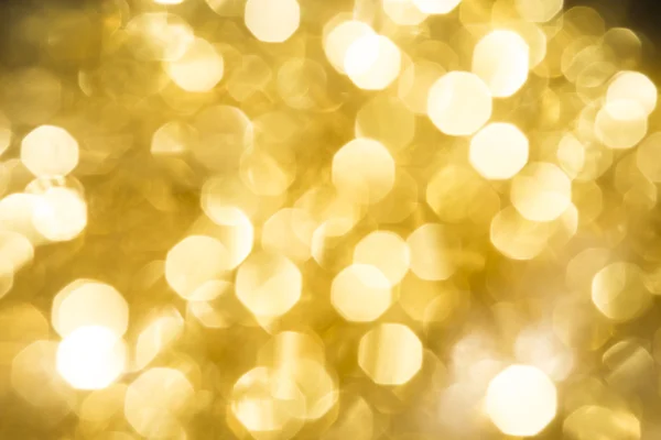 クリスマスの背景とぼやけた b と黄金の抽象的なキラキラ — ストック写真