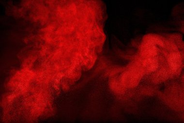 Kırmızı toz bulutu koyu arka plan
