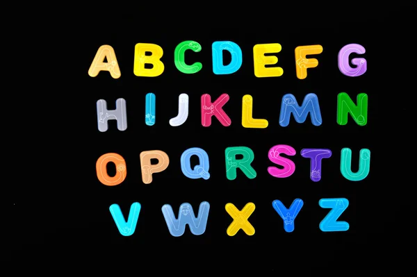 Alphabet Bright Letters Black Background — Stock Photo, Image