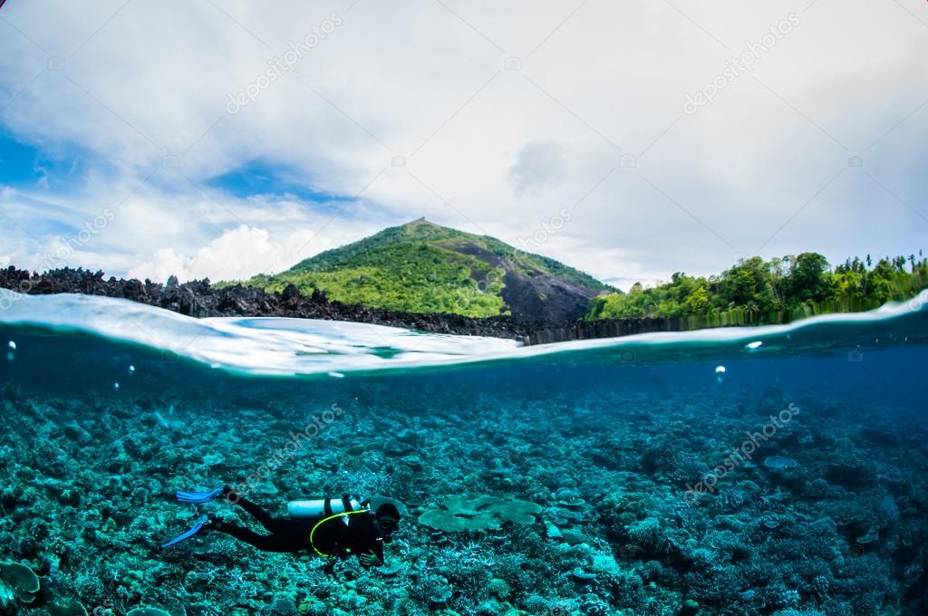 Diver below the surface in Banda, Indonesia underwater photo