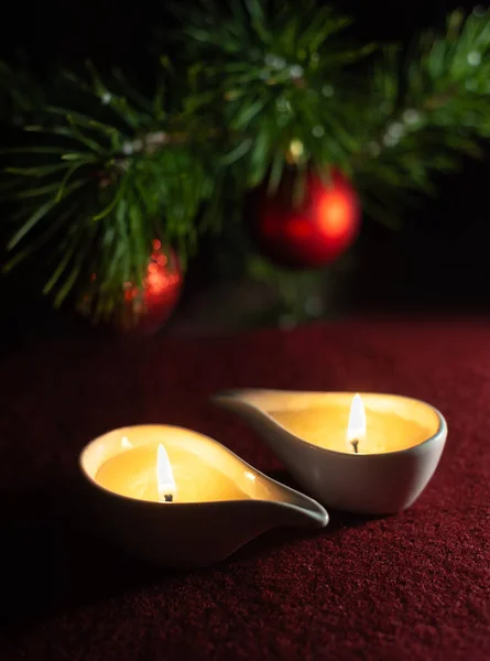 Dos Velas Encendidas Por Noche Fondo Borroso Del Árbol Navidad —  Fotos de Stock