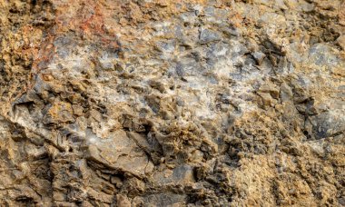 Türkiye 'nin Alania kentinde bulunan açık sarı ya da sarı kireç taşı. Kayalar yıpranma ve aşınma nedeniyle deliklerle doludur. Yıpranmış kireç taşı dokusu arkaplanı