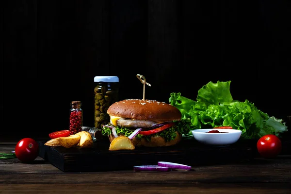 Beef Burger Served Grilled Potatoes Jar Capers Sauce Rosemary Cherry — Stock Photo, Image