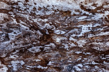 Gri, beyaz ve kahverengi renkli kayalık arkaplan 