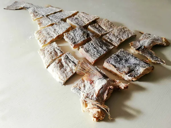Bacalao is a dried, salt cured cod fish that makes for a mouth-watering taste and texture. Bacalao a la vizcaina originates from the Basque region of Spain. In Portuguese, bacalhau seco  bacalhau in Italian Baccal. Table top view.