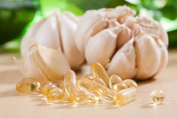 Garlic oil capsules with garlic