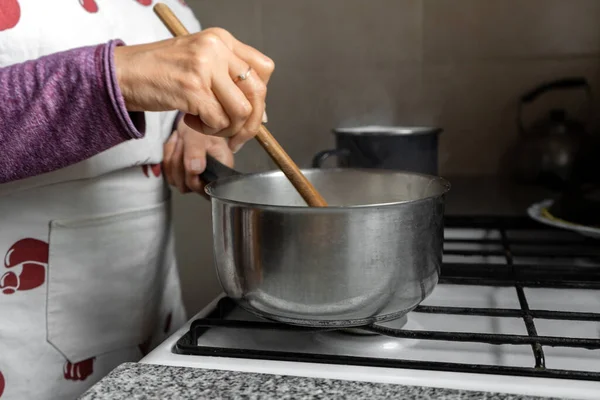 Woman Cooking Home Stirring Pot Side View — Stock Photo, Image