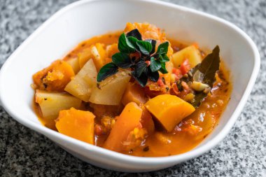 Close-up of vegetable stew in a white bowl