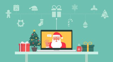 Noel Baba, Noel ikonu ile dizüstü bilgisayara seslenen videoyla selamlıyor ve masada hediyeler, şekerler, fincanlar ve Noel ağacı ile süslüyor.