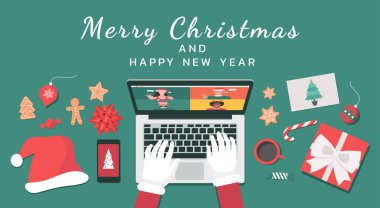 Noel Baba eli bilgisayarı kullanarak insanlarla görüntülü görüşme ve Noel tatilinde Mutlu Noeller mesajı ve düz çizim yoluyla sanal tartışmalar yapıyor.