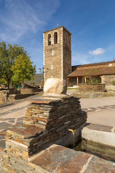 Fountain in front of the church — Stock Photo, Image