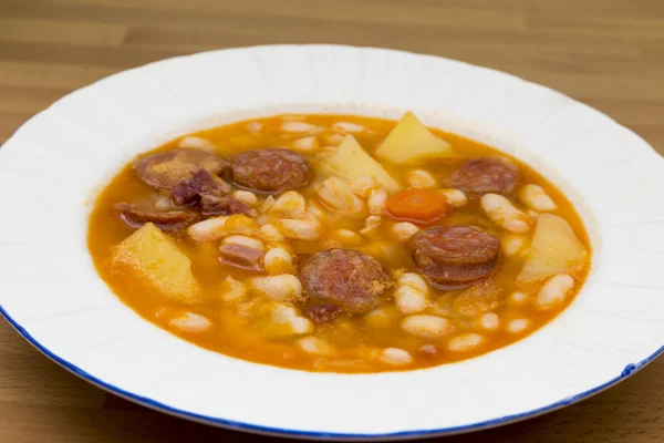 Beans with sausage — Stock Photo, Image