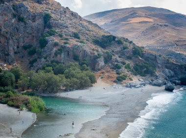 Yunanistan 'daki Beton Adası' nın güney tarafındaki Plakias sahil sahiline bir gezi.