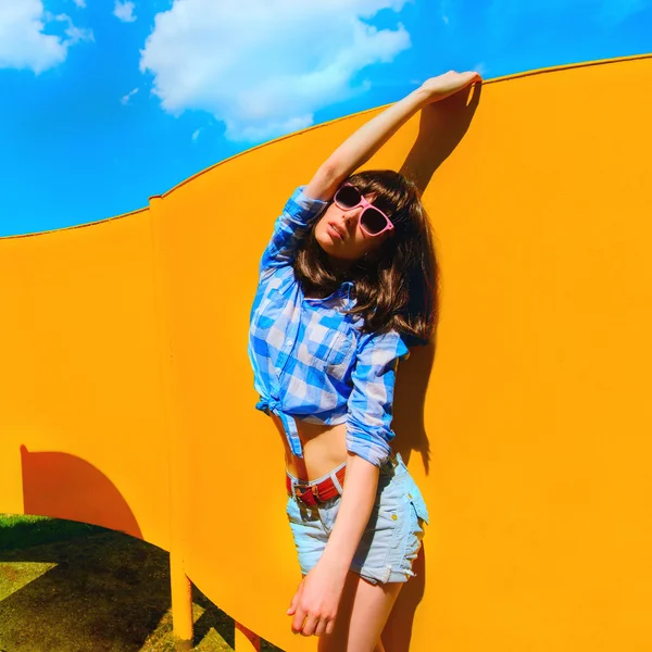 Portrait of a beautiful relaxed girl with glasses blue shirt on — Stock Photo, Image