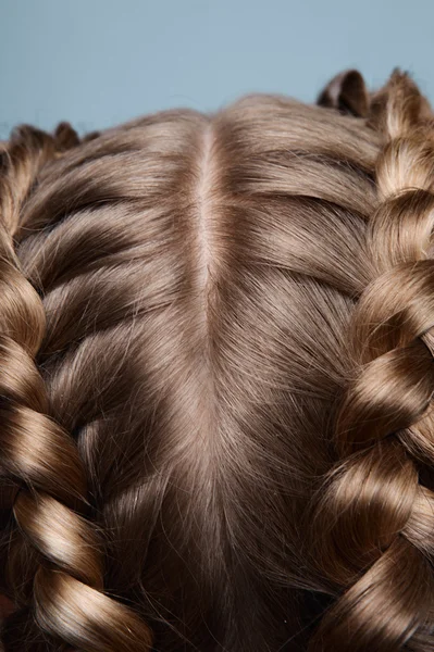 Close-up blonde head with pigtails — Zdjęcie stockowe