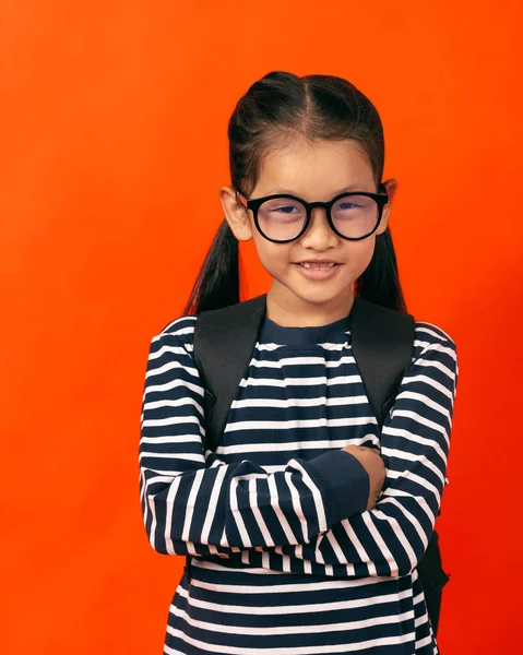 Asian Girl Glasses Cross One Arm Orange Background — Stock Photo, Image