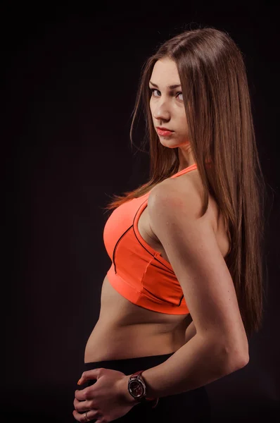 La chica en ropa deportiva en el estudio — Foto de Stock