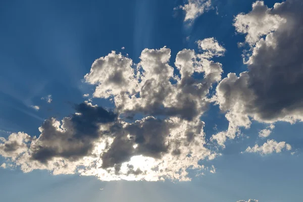 Low clouds at sunset on sunny day