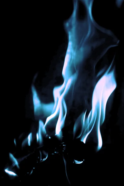 Fire isolated on a black background. Bright blue flames. — Stock Photo, Image