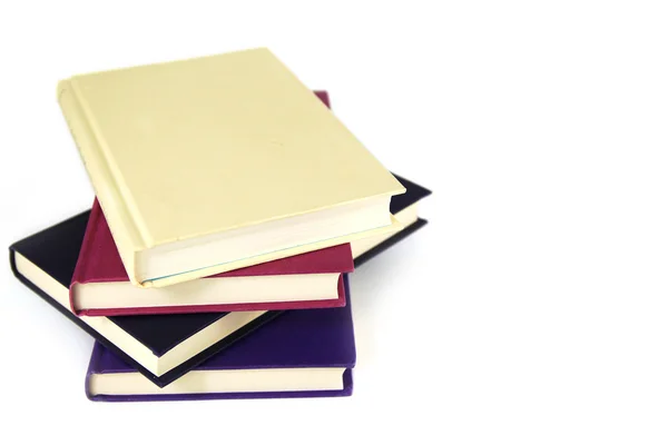 Pile of 4 plain covered books — Stock Photo, Image